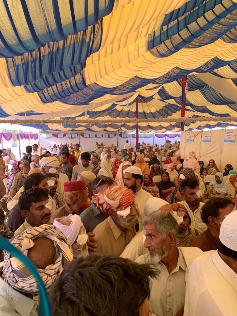 Patients with eye patches gathered for their follow-up session