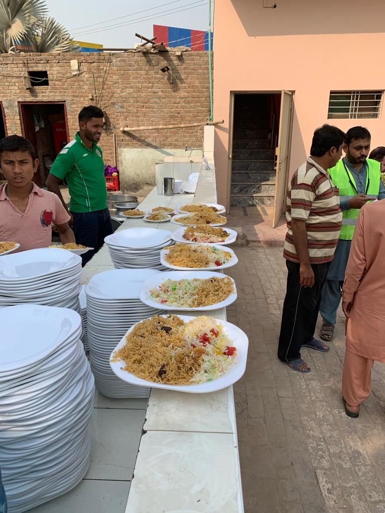 Plates of rice stacked and ready to serve