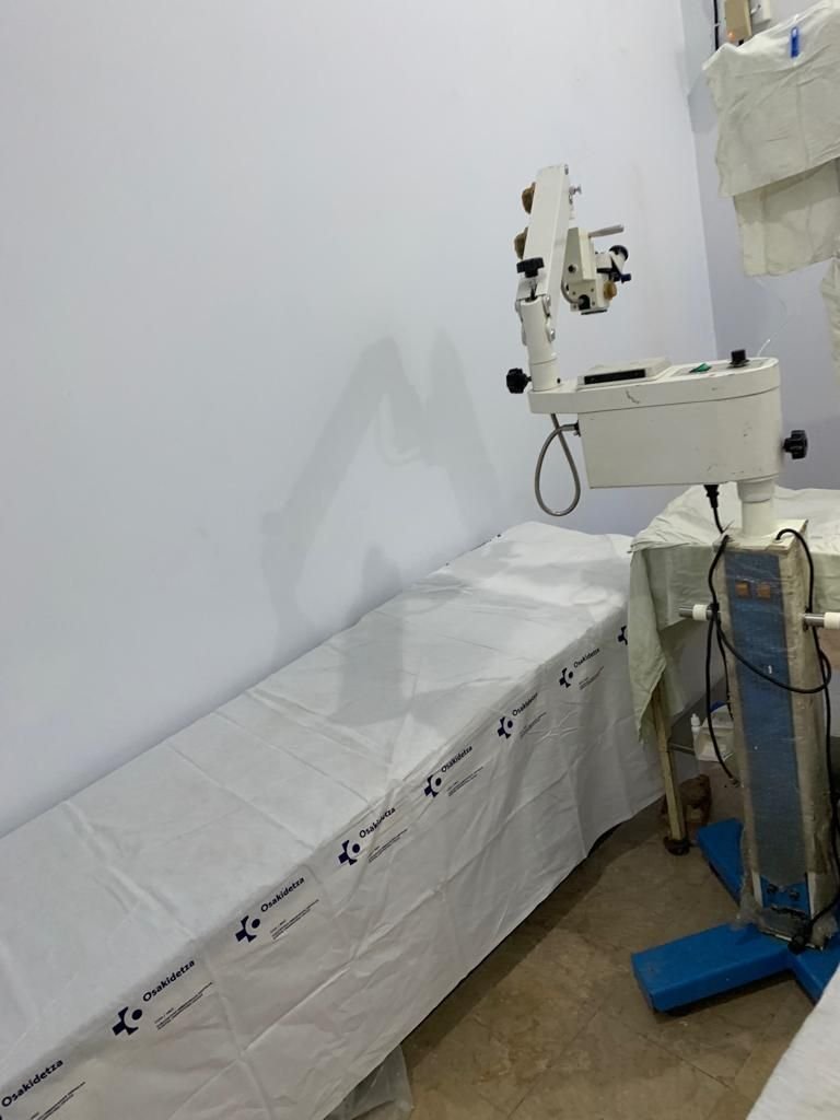 The clean, empty operating theatre with a surgical microscope